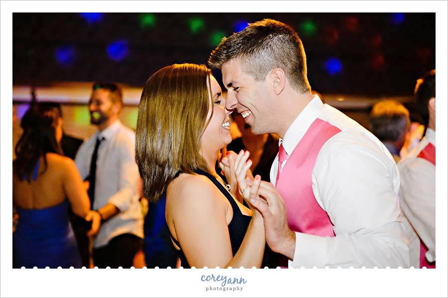 Groomsman dancing during reception at Shady Hollow Country Club
