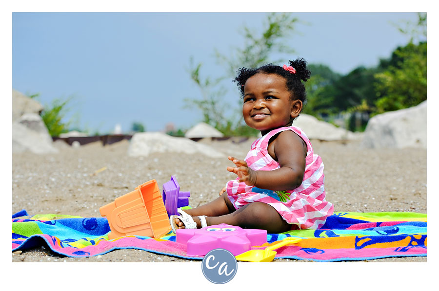 one year old on the beach in lorain