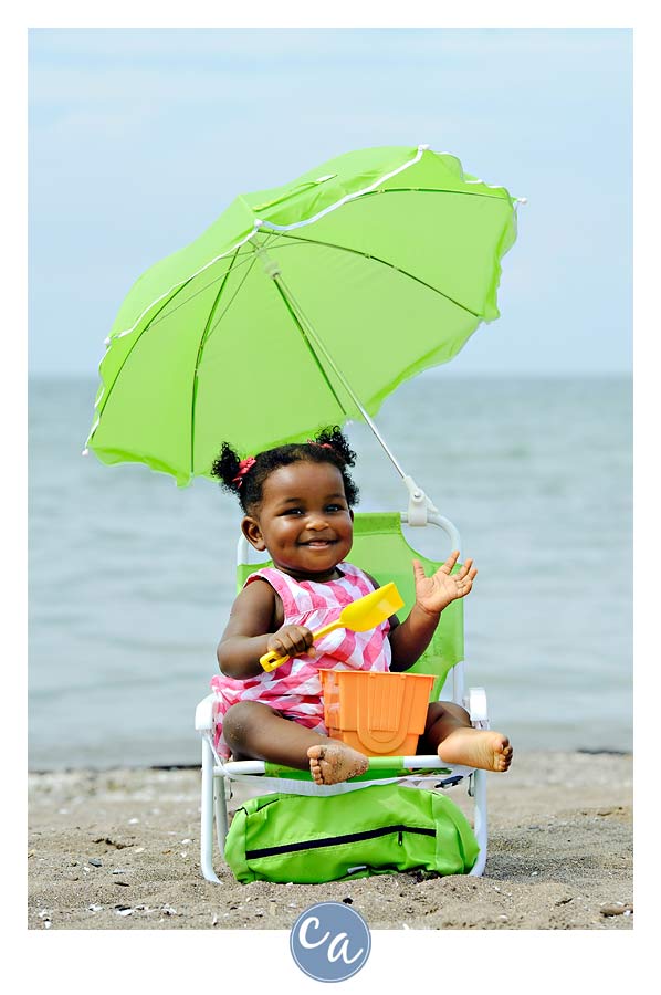 Brianna's One Year Portrait one year old on beach on Lake Erie