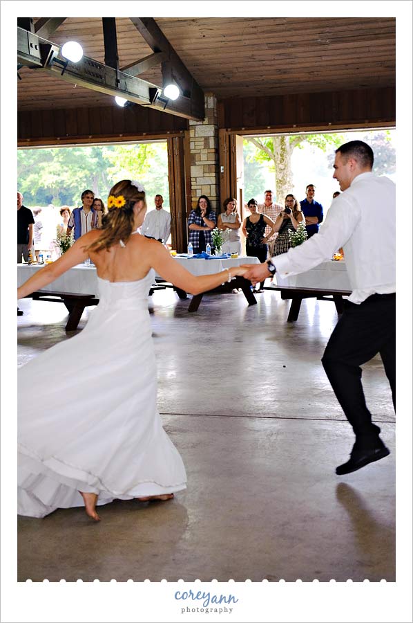 Chrissanna and Robert's Wedding in Akron guests watching bride and groom's first dance