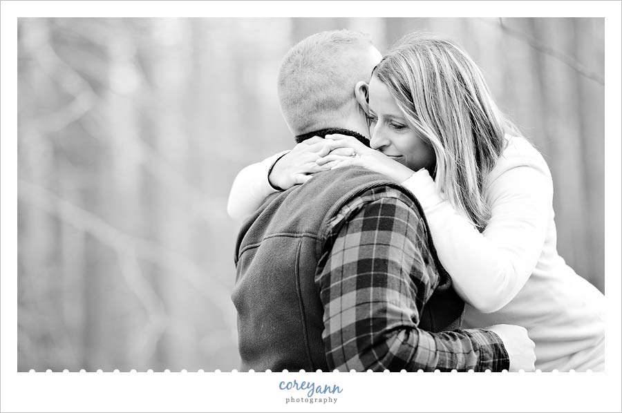 husband and wife embrace