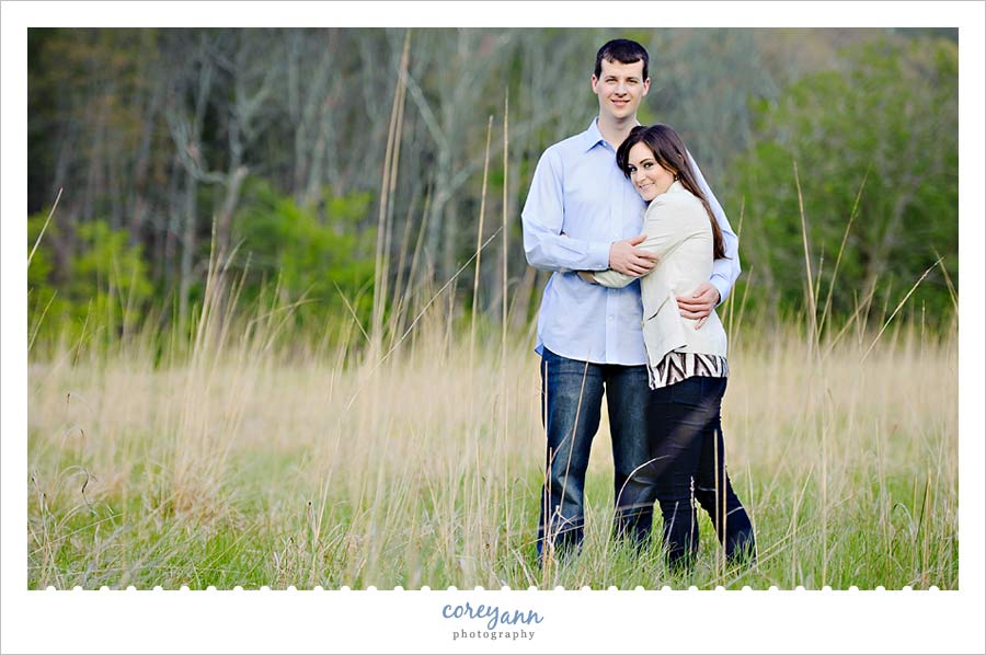 engagement session in a field in cuyahoga valley national park in Ohio