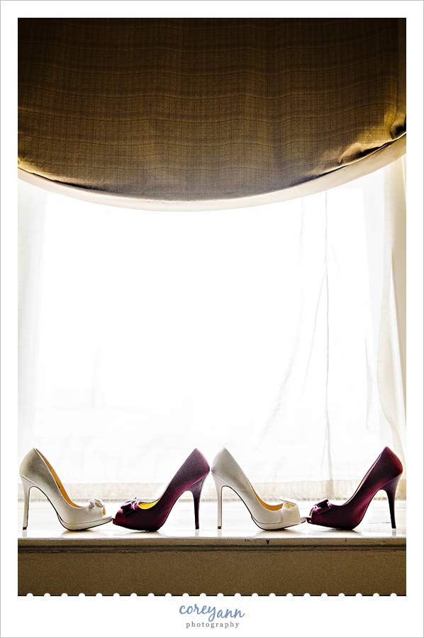 wedding shoes in front of a window in cleveland ohio