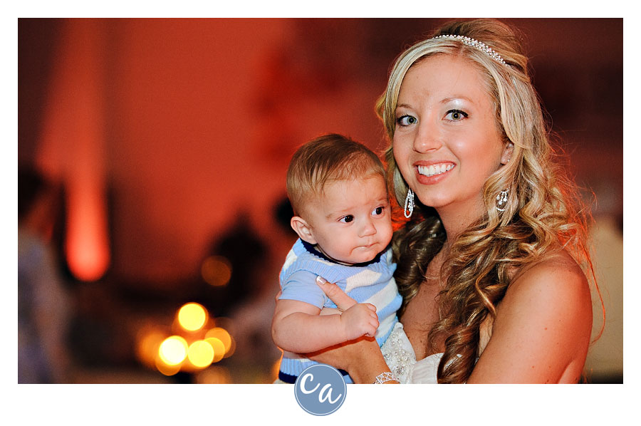 bride and baby during reception