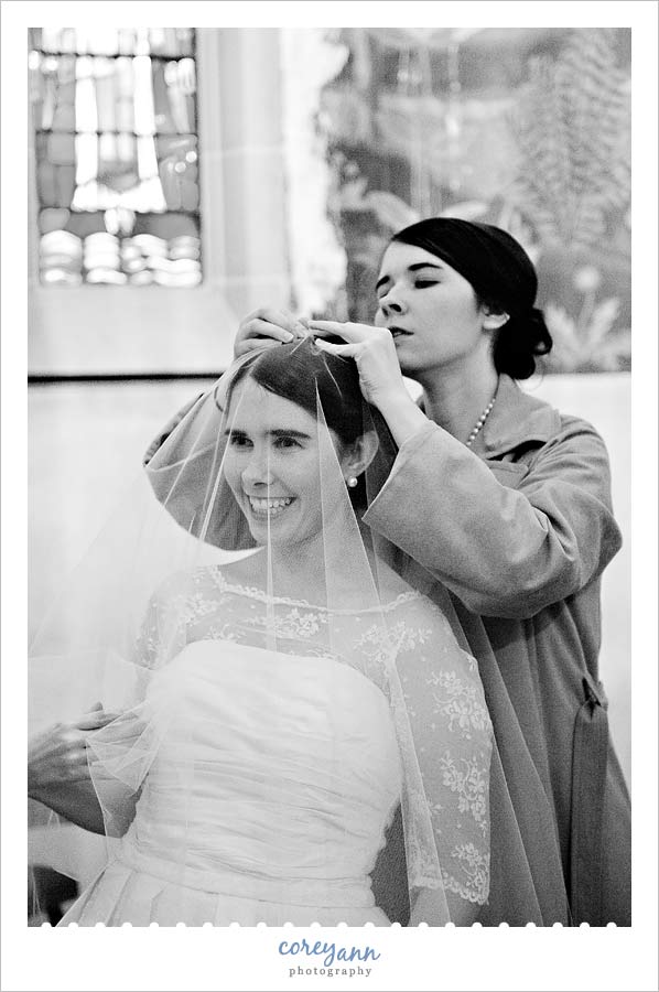 bride getting ready at st john the evangelist in cleveland