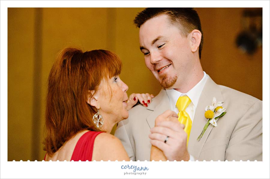 Emily and Jason's Wedding groom and mother dance at the lodge at geneva on the lake
