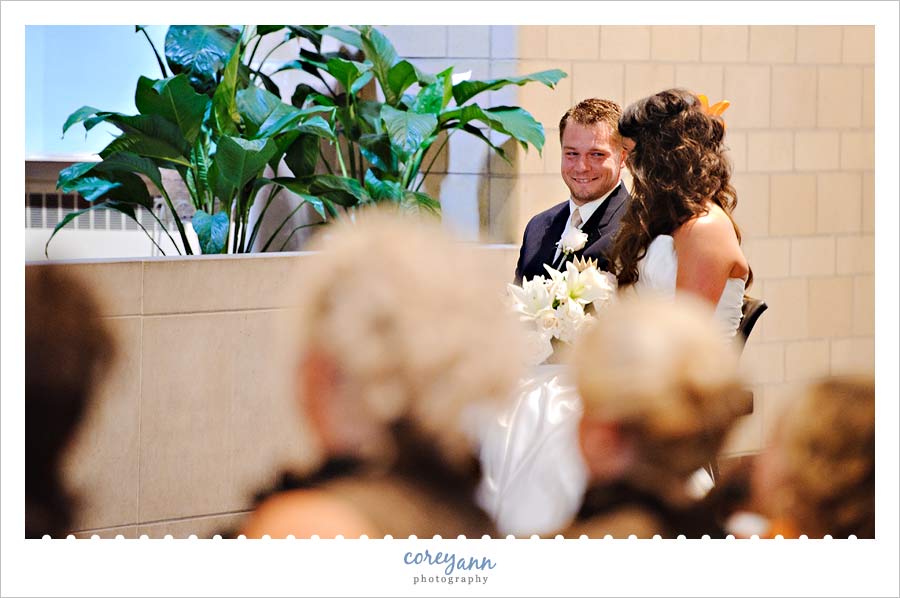 bride and groom during ceremony at our lady of angels in cleveland