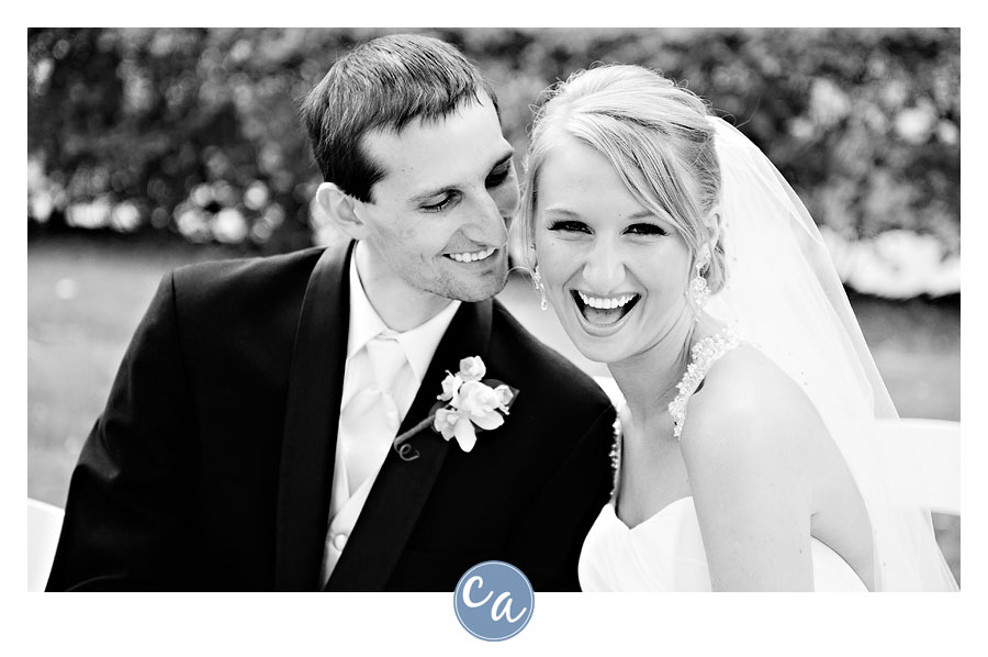 bride and groom laughing after ceremony at the glidden house