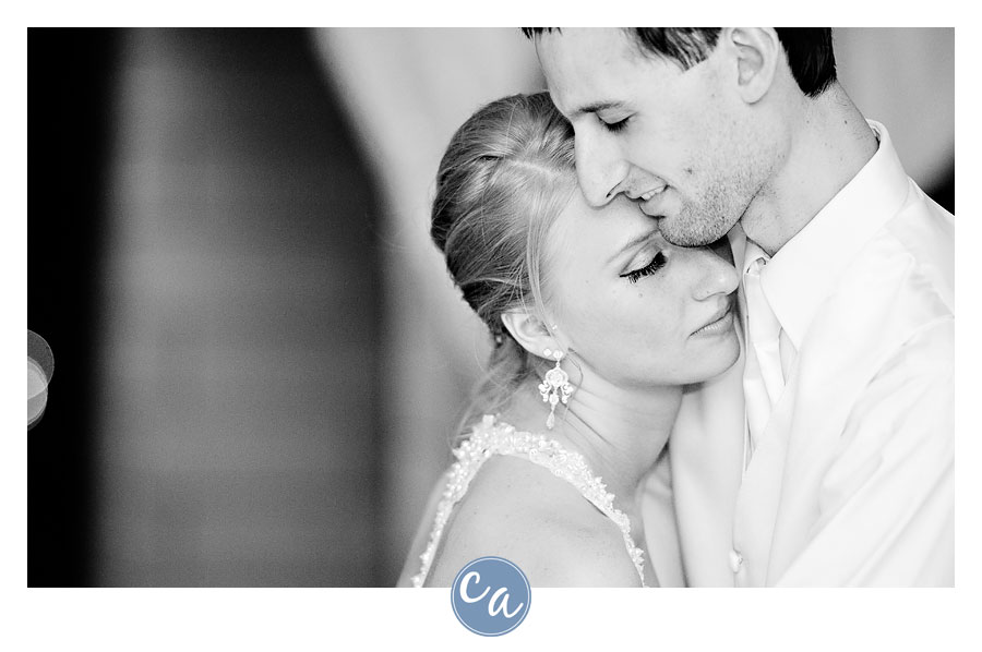 bride and groom dancing during reception at the glidden house