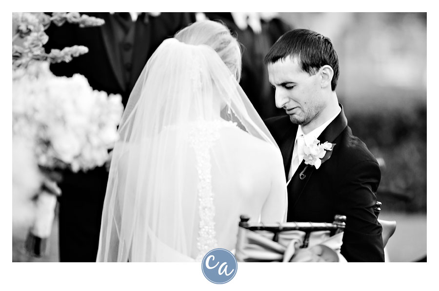 groom crying during vow exchange during ceremony