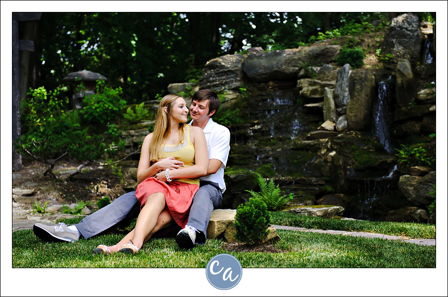 couple in front of waterfalls in japanese gardens in akron ohio