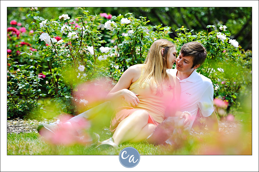 couple kissing in rose gardens at stan hywet