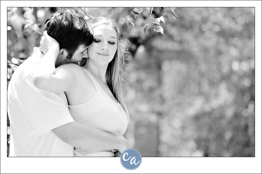 couple hugging in birch alee