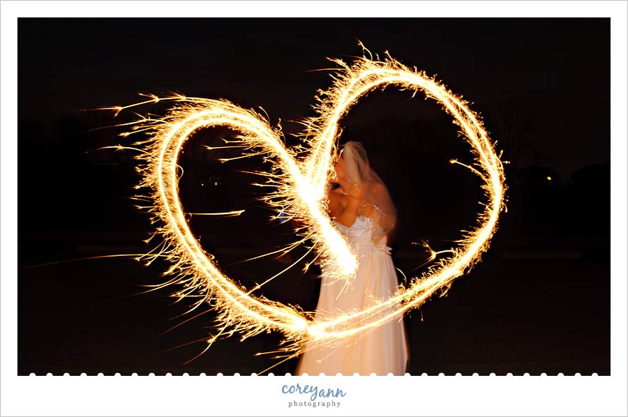 Joe & Marta's Wedding in Medina bride and groom heart with sparkler in ohio