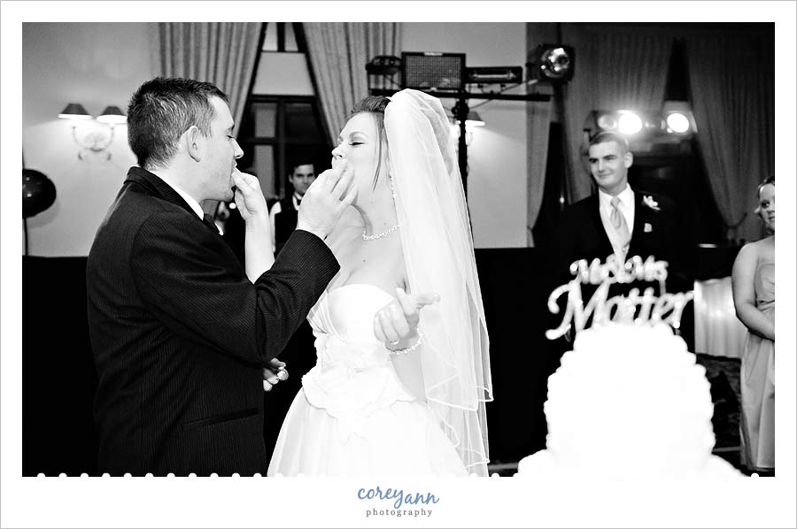 Joe & Marta's Wedding in Medina bride and groom during cake cutting in medina ohio