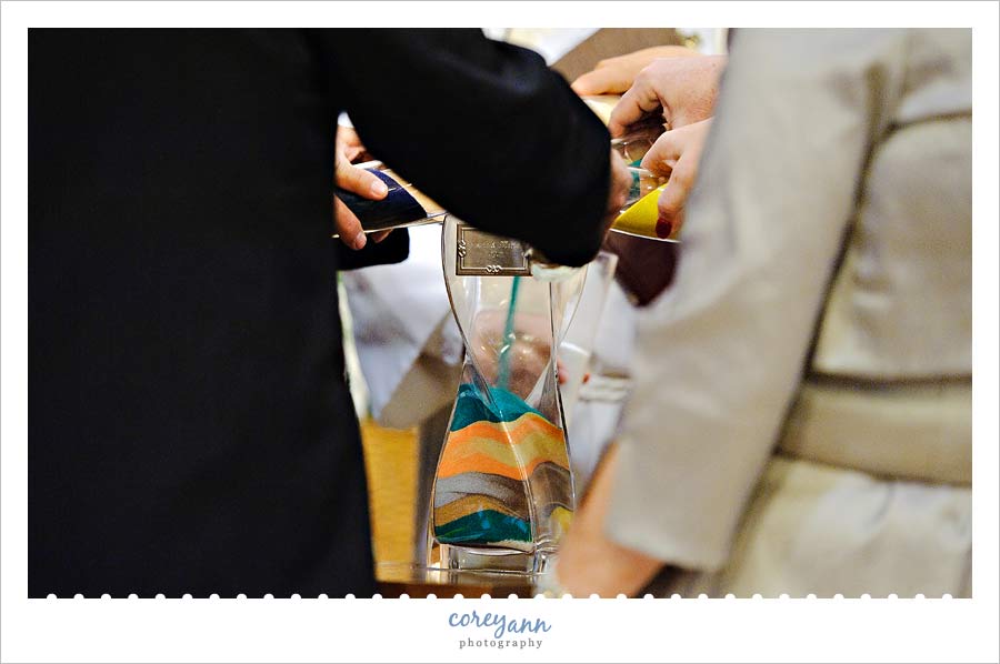 Joe & Marta's Wedding in Medina sand ceremony with all family members during wedding