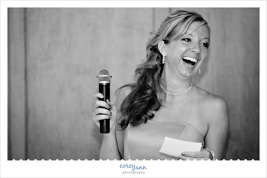 David and Kelli's Wedding matron of honor laughing during toast in dover ohio
