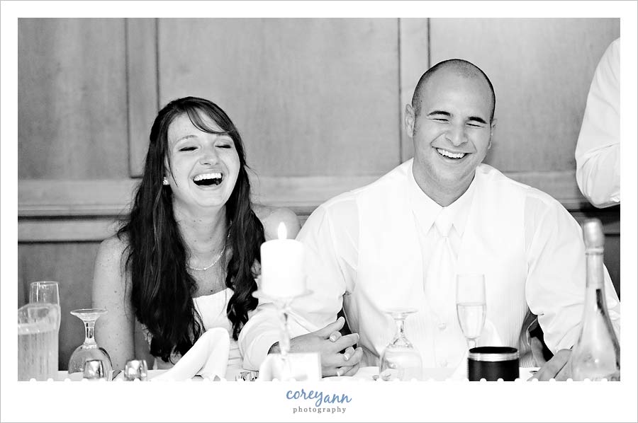 David and Kelli's Wedding bride and groom laughing during toast in dover ohio