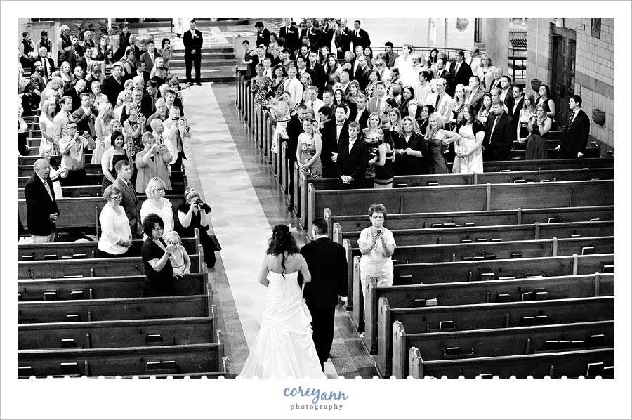 brides father walking bride down aisle from above in cleveland ohio