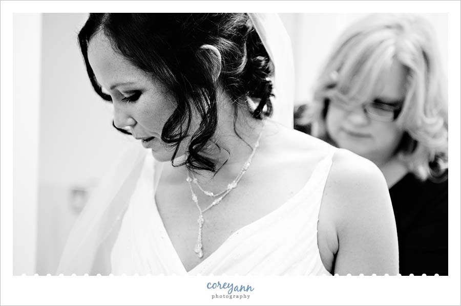 bride getting dressed at holden arboretum in kirtland ohio