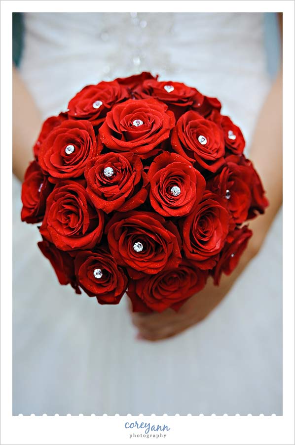 red rose bouquet with crystals inside the flowers