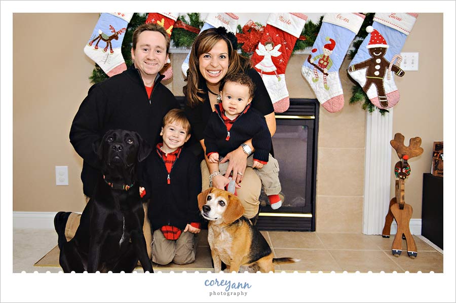 family portrait in front of fireplace in avon ohio