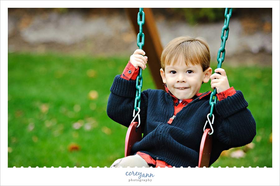 child swinging on swingset in avon ohio
