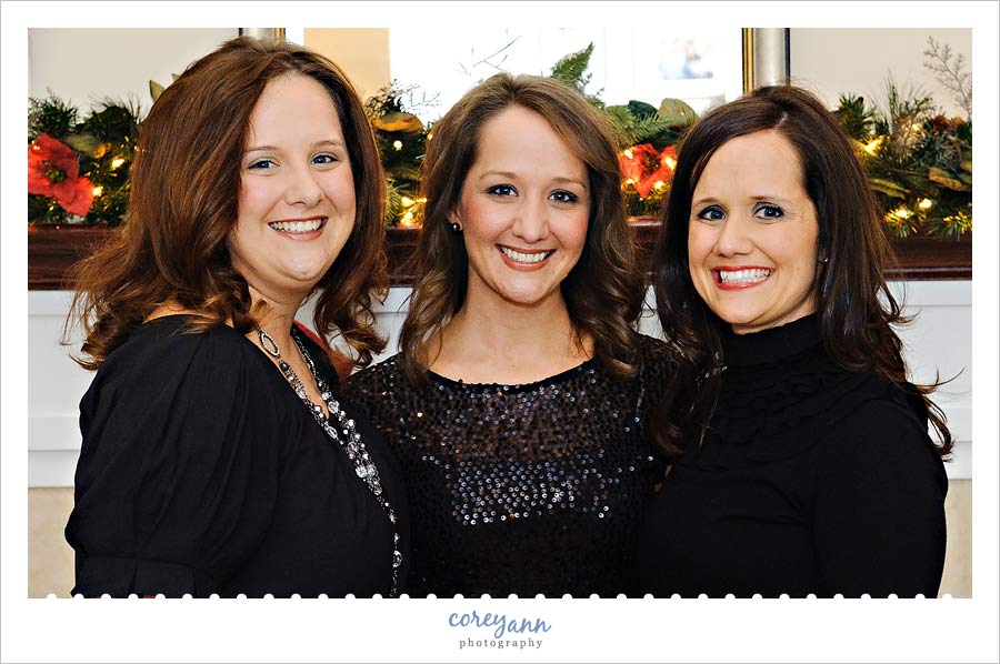 sisters portrait in front of fireplace