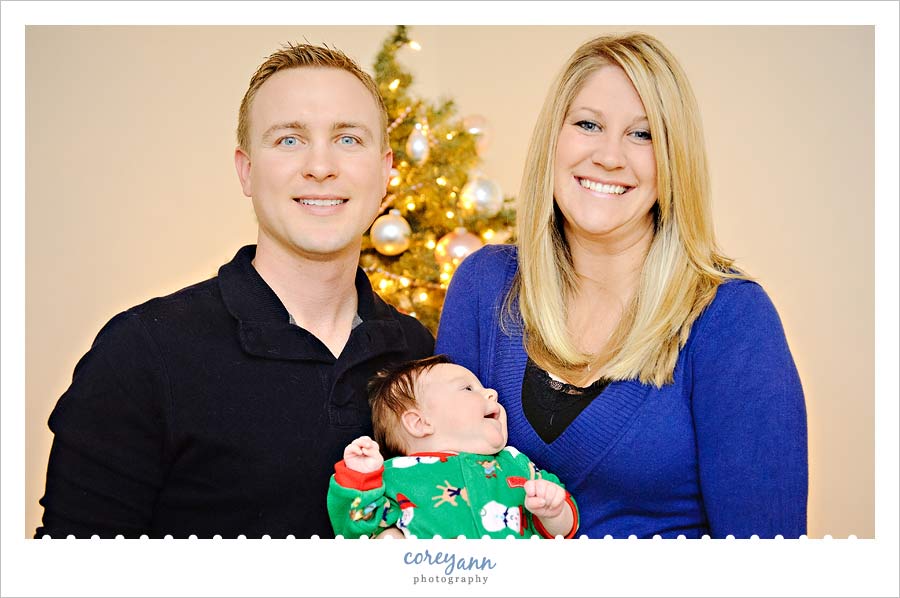 family portrait in front of christmas tree in ohio