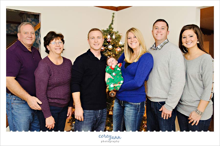 family portrait in front of christmas tree in ohio