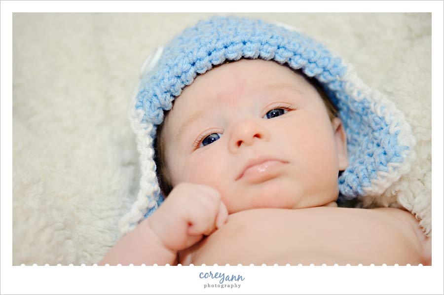 two month old baby with knitted hat in ohio