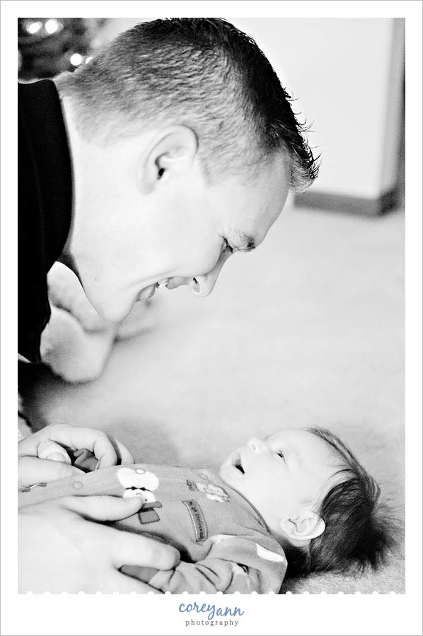 father and baby boy laughing