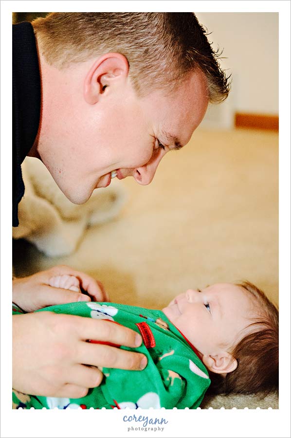 father and baby boy laughing