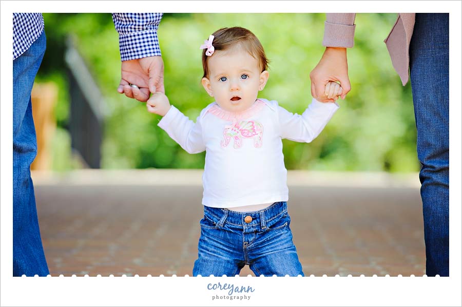 Family Portrait Session at Fellows Riverside Gardens one year old child with parents at fellows riverside gardens