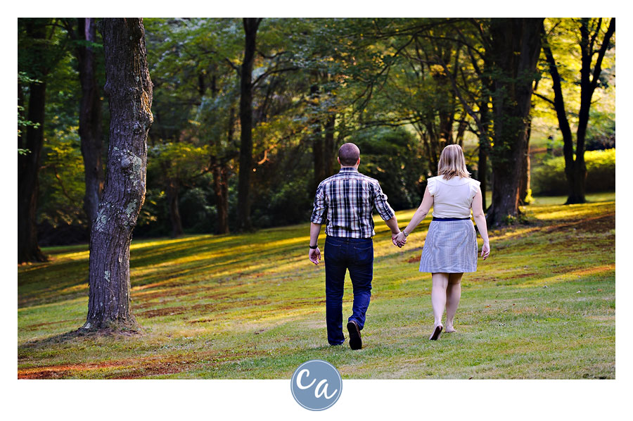 couple walking through forest in Ohio