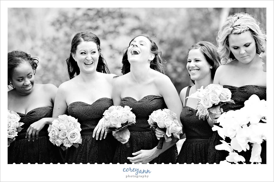 bridesmaids laughing during wedding pictures