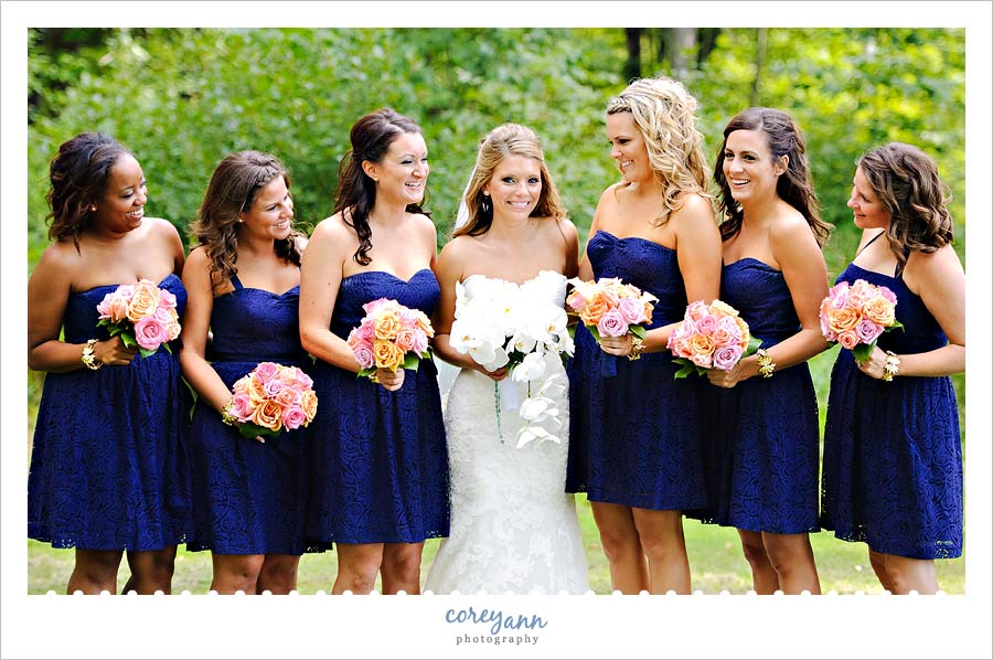 bridesmaids in blue dresses at buhl park at avalon lakes country club