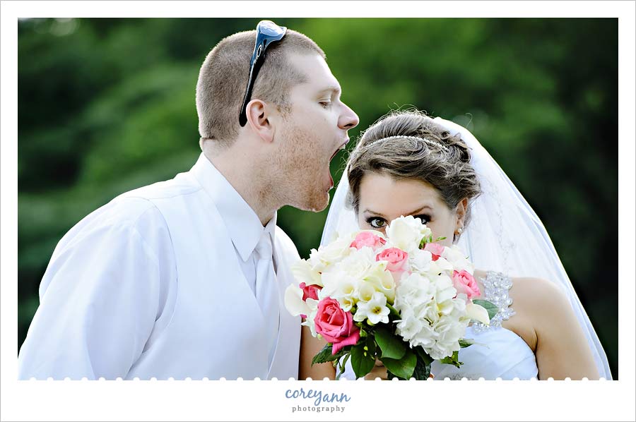 bride and groom making silly faces during portrait session