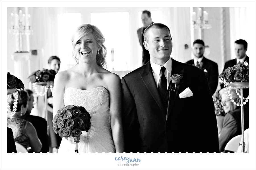 bride and groom recessing down the aisle in ohio