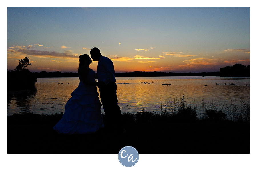 bride and groom silhouette at sunset in ohio