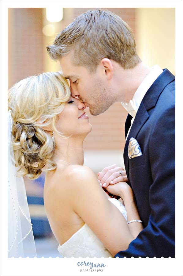 groom kissing bride's nose in ohio