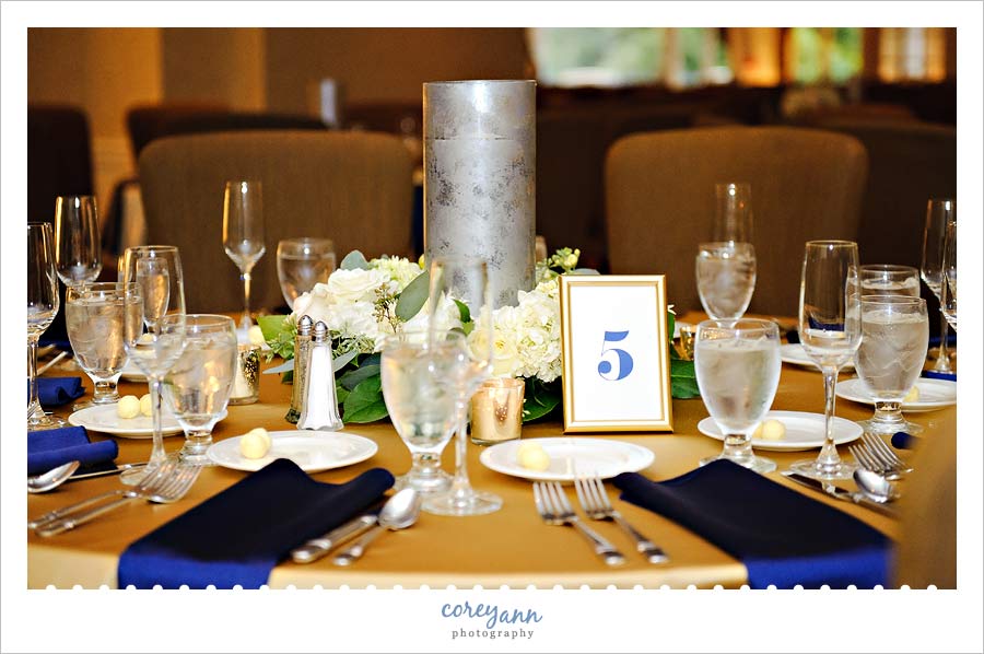 navy and gold centerpieces at shaker heights country club