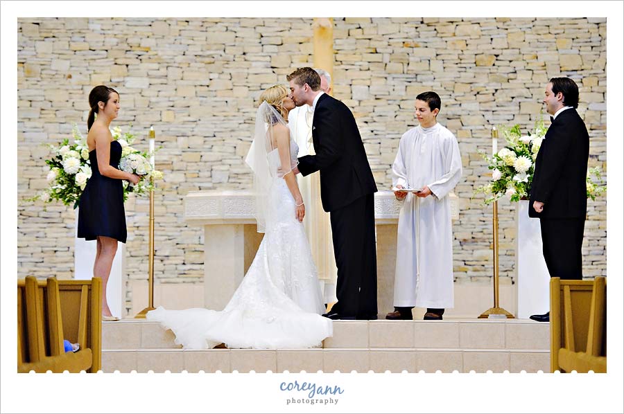 first kiss during wedding ceremony at st anslem in chesterland ohio