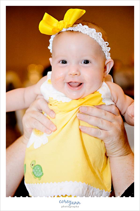 adorable baby at a wedding reception at geneva-on-the-lake