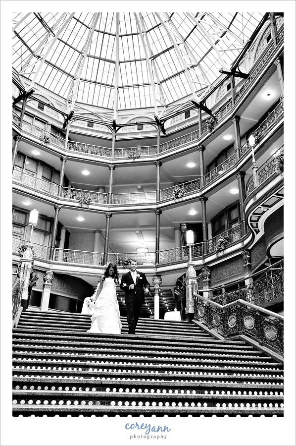 grand entrance of bride and groom into reception at the arcade
