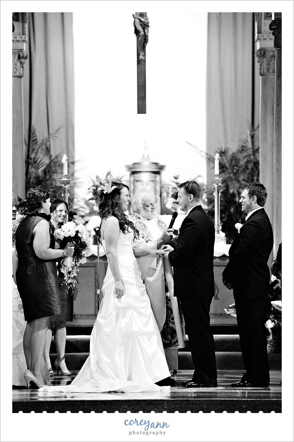 bride and groom during ceremony at our lady of angels in cleveland