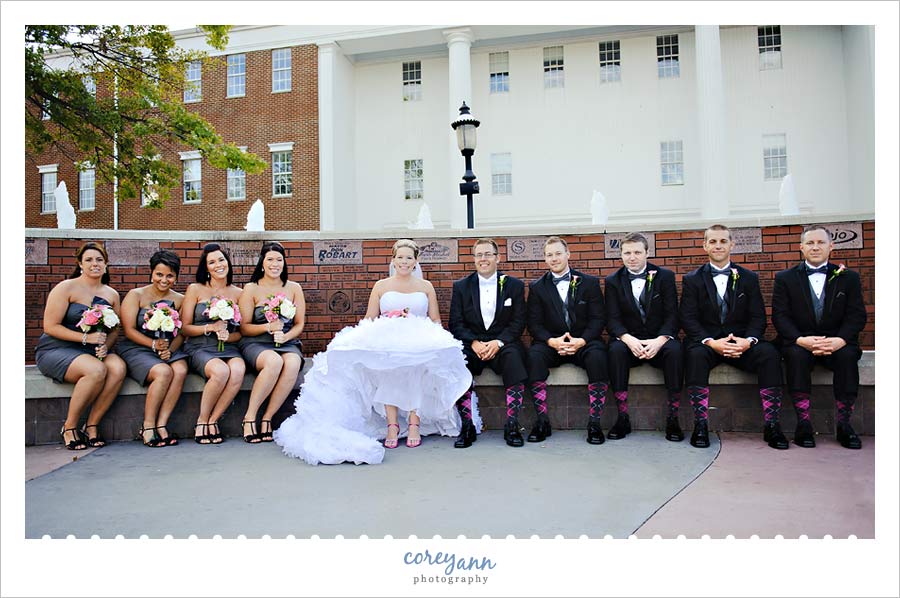 bridal party in pink and black with argyle socks