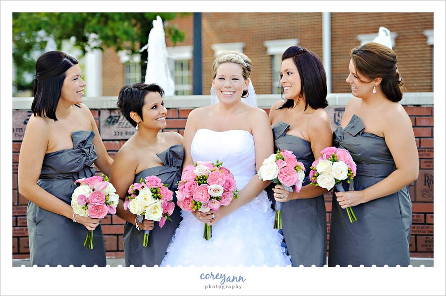 bride with bridesmaids in grey and pink