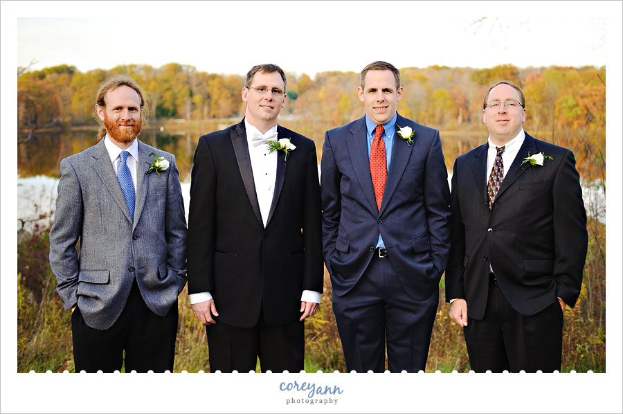 groom and groomsman in suits 