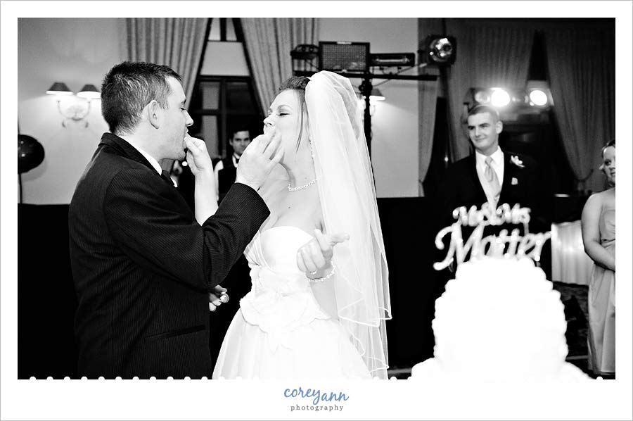 bride and groom during cake cutting in medina ohio
